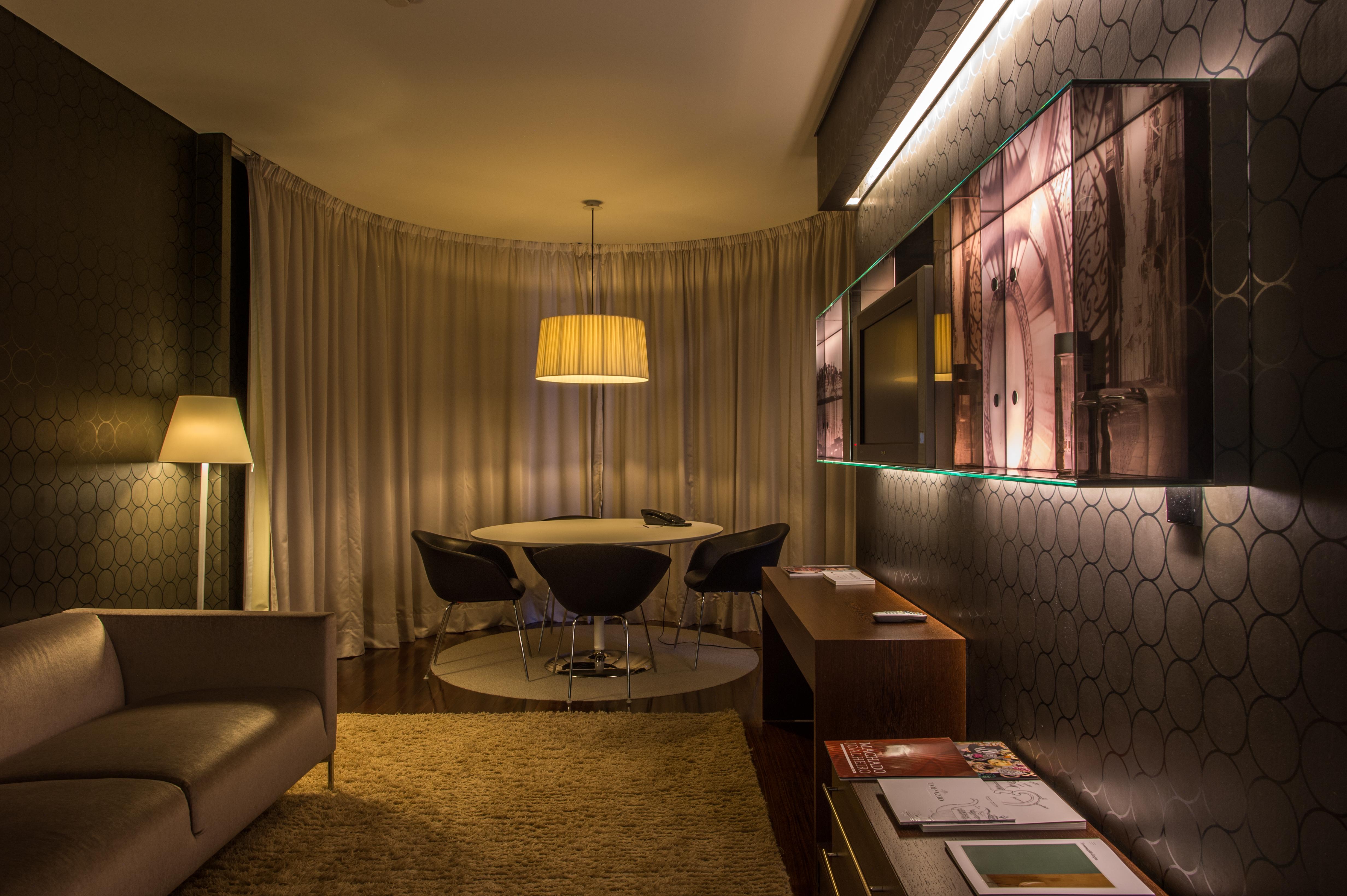 Porto Palacio Hotel By The Editory Exterior photo The interior of a suite at the hotel