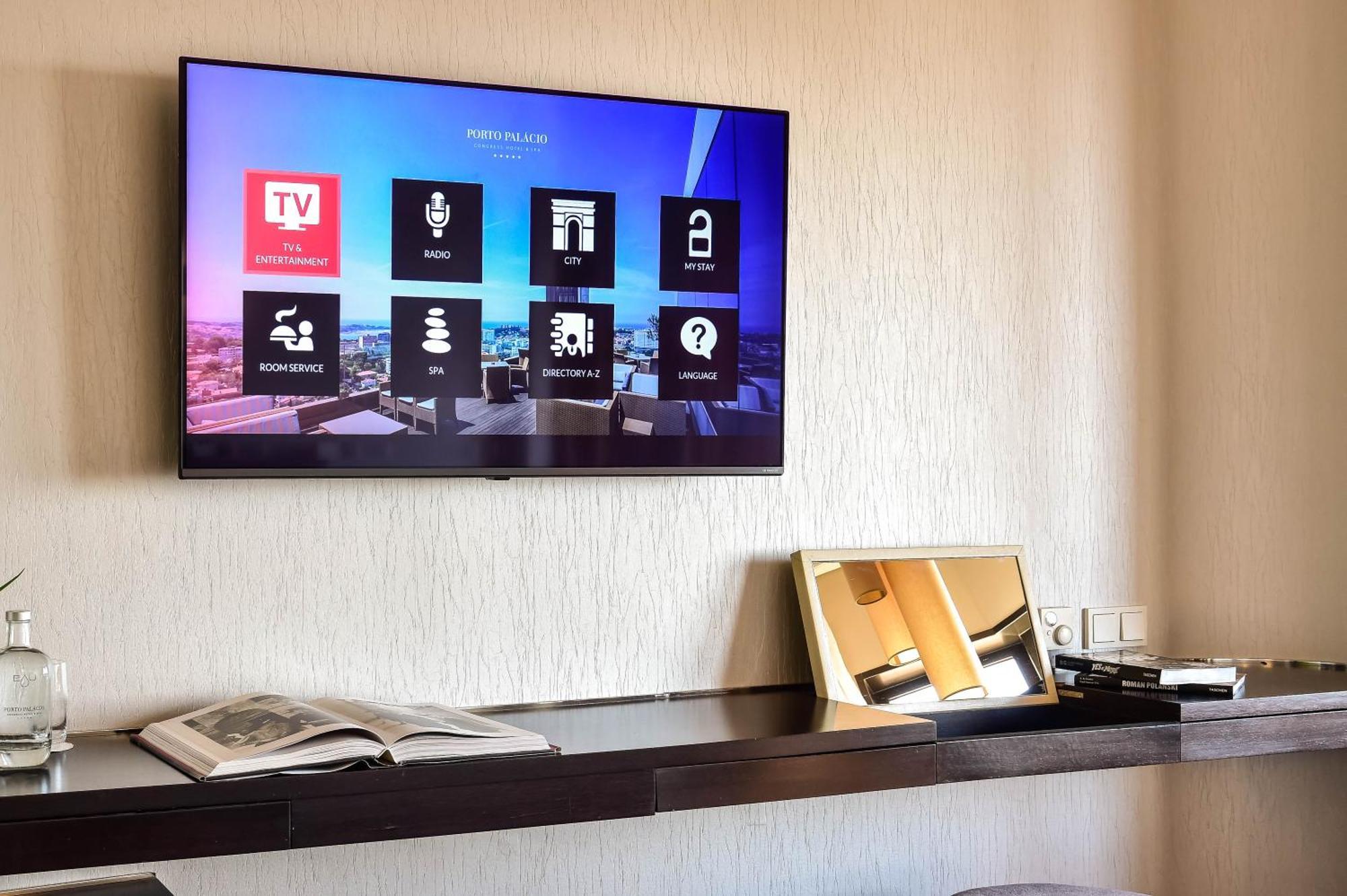 Porto Palacio Hotel By The Editory Room photo A television with a smart TV interface
